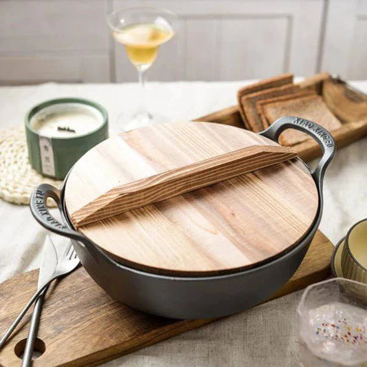 25 cm non-stick uncoated casserole pan with a smooth surface and sturdy handles, perfect for cooking and serving.