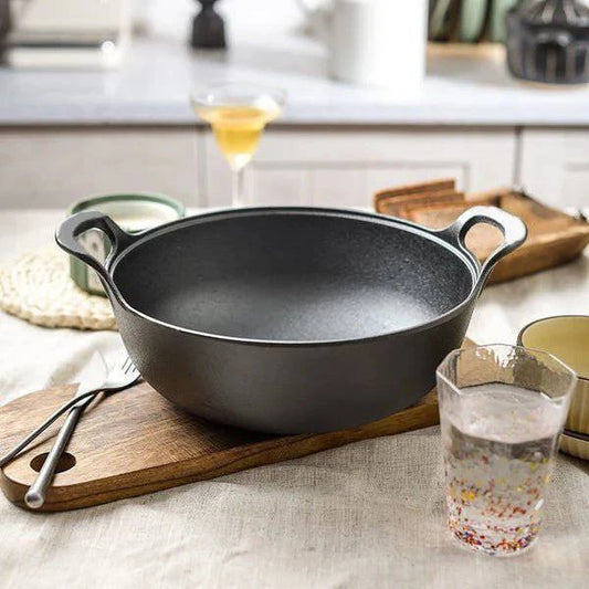 25 cm non-stick uncoated casserole pan with a sleek design, perfect for cooking and serving meals.